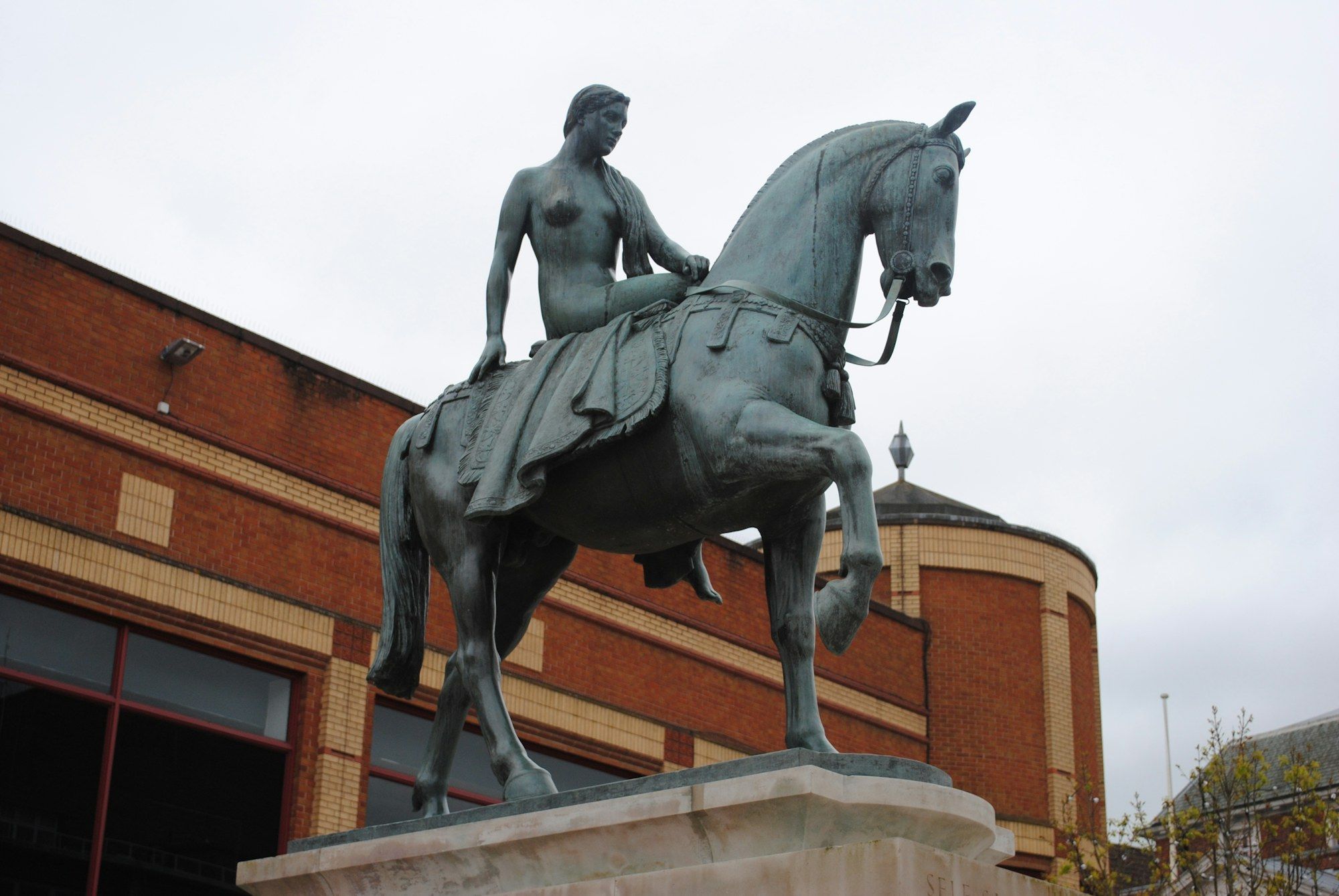 Bronze statue of a rider on horseback in Coventry city centre